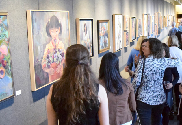 People looking at art in the Vandroff Art Gallery.