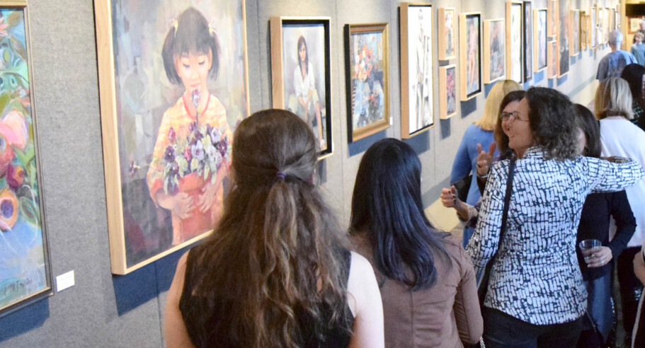 People looking at art in the Vandroff Art Gallery.