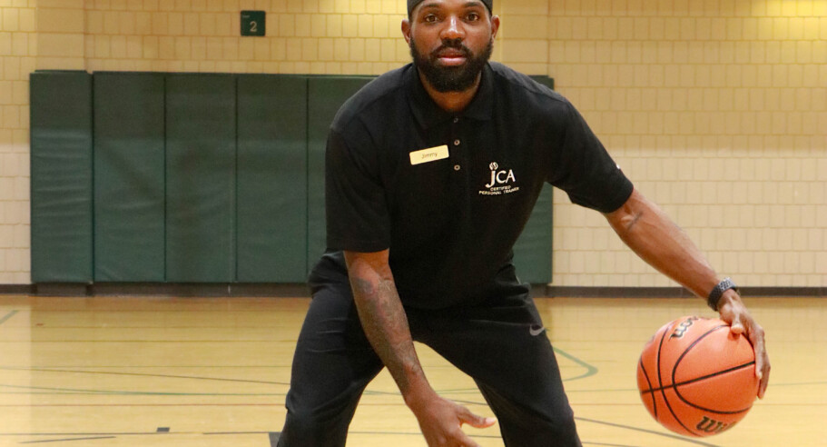 Private basketball instructor on the court.