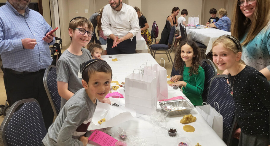 Families celebrating a Jewish holiday.