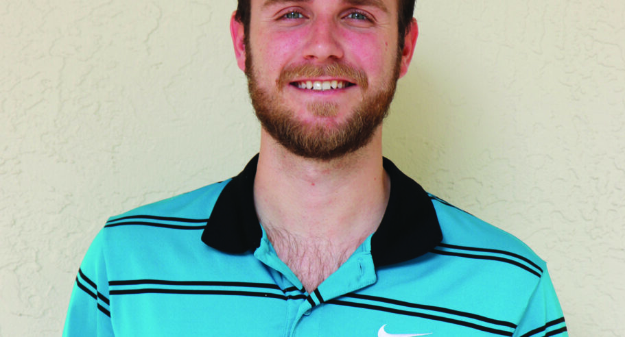 A man wearing a striped nike shirt.