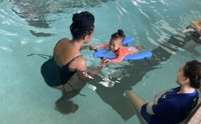 A mom and daughter during Parent and Me swim lessons.