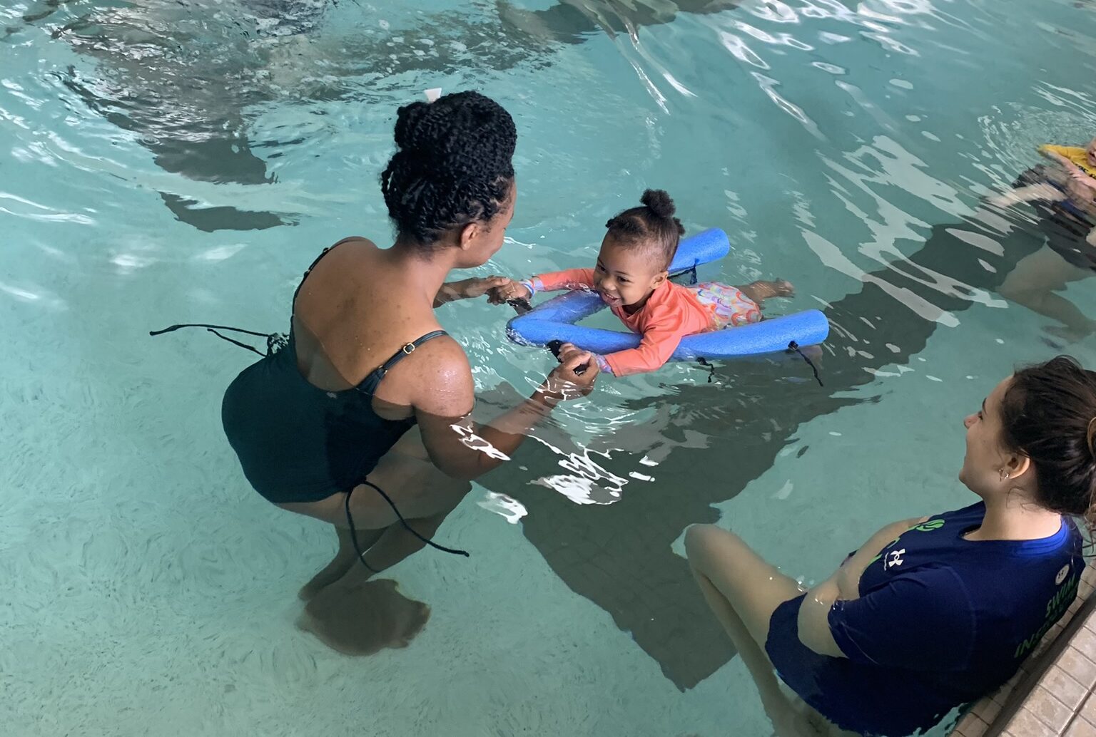 A mom and daughter during Parent and Me swim lessons.