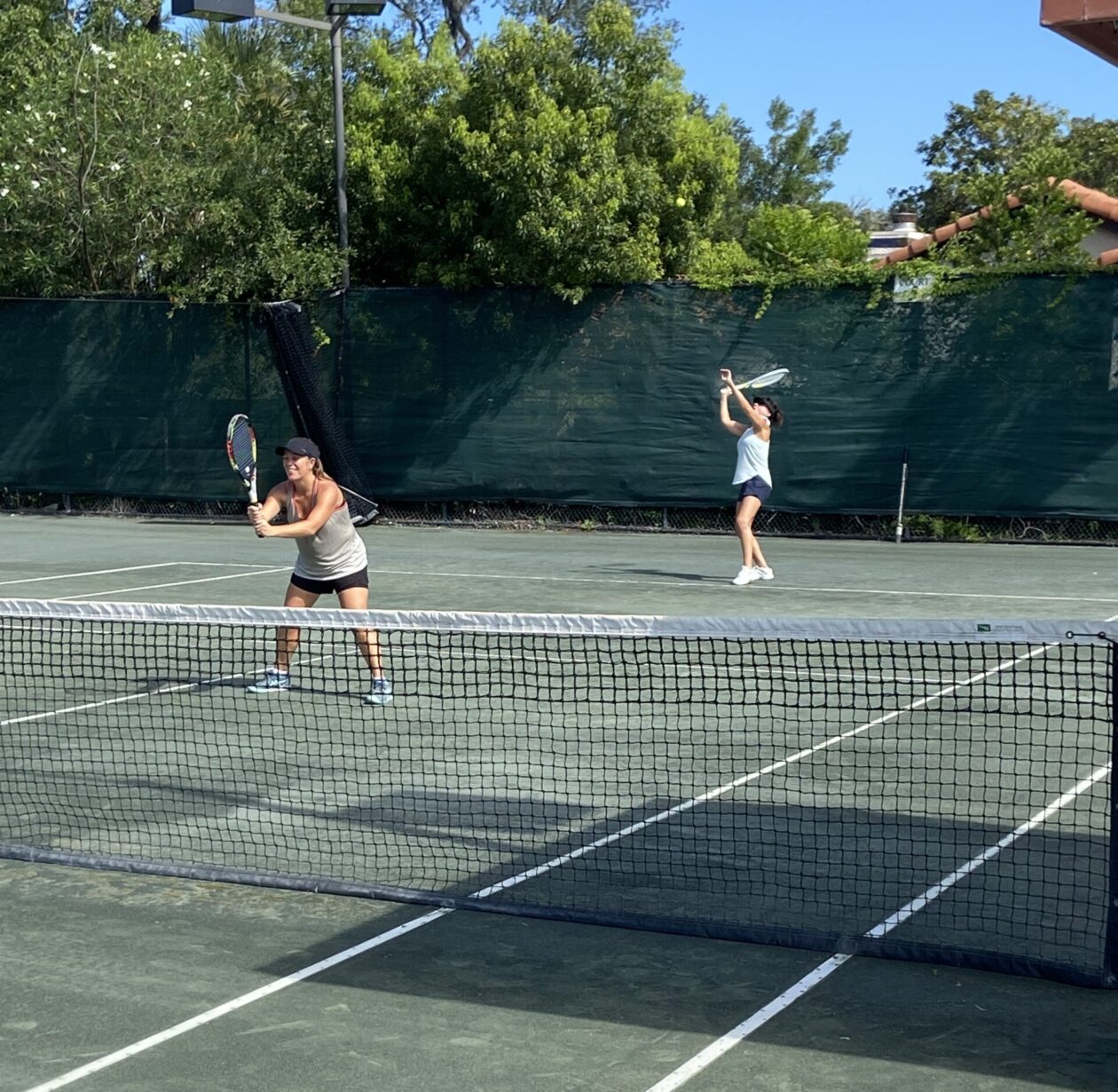 A tennis court with a net.