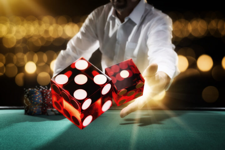 Man gambling at the craps table