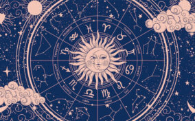 The zodiac sign of the sun, moon and stars on a blue background.