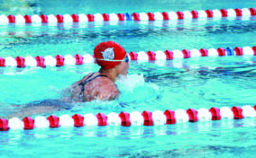 A young swimmer on the JCA Makos Swim Team swimming