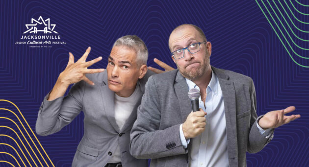 Two men in suits, one with grey hair making expressive hand gestures and the other bald with glasses holding a microphone, stand in front of a blue background with the Jacksonville Jewish Cultural Arts Festival logo.