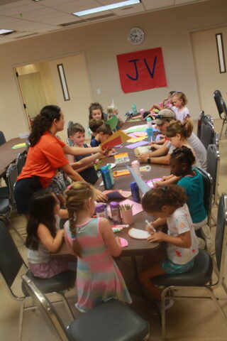 A group of children at a table.