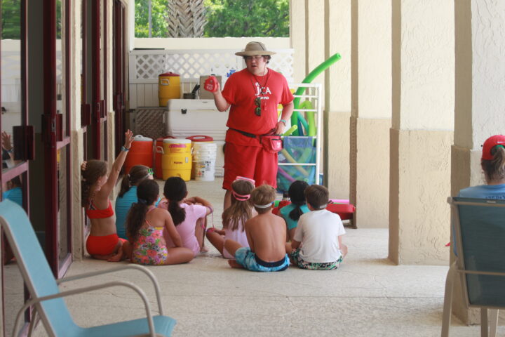 A man in a red shirt.