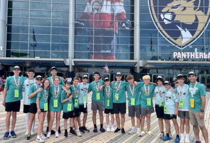 A group of coaches and teen athletes from the 2023 JCA Jacksonville Maccabi Team.