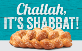 A braided loaf of challah bread sits in front of a turquoise background with the text "Challah, It's Shabbat!" in bold white letters.