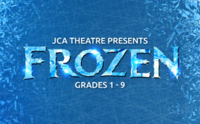 Blue background with ice patterns. Text reads: "JCA Theatre Presents Frozen Grades 1-9." The word "Frozen" appears in large, icy letters.