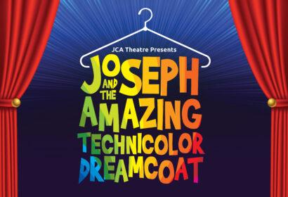 Colorful text forming the shape of a coat hanger reads "Joseph and the Amazing Technicolor Dreamcoat" with red curtains on the sides and "JCA Theatre Presents" above.