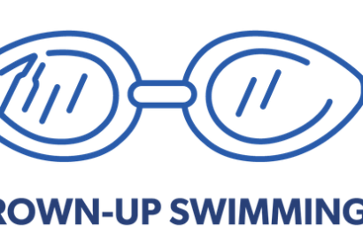 Outline drawing of swim goggles above the words "GROWN-UP SWIMMING™" in bold, blue text on a light background.