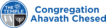Logo of Congregation Ahavath Chesed featuring a circle divided into three sections with Hebrew letters, a Torah scroll, and a menorah.